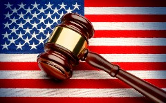 Droits de douane américains : la justice s’en mêle